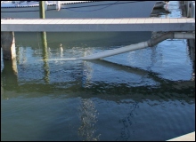 Strainer lowered into the 