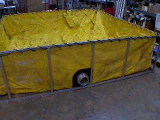 sidewall strainer water shark on the outside of dump tank